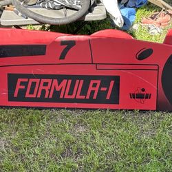 Older vintage Formula 1 F1 race car bed 