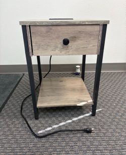 Table with electric outlet