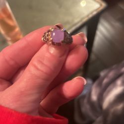 Lavender Jade Set In 14 Karat Gold With Amethyst On Both Sides Of The Ring