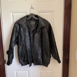Black Genuine Leather Jacket.  (Size 16).  Young Adult