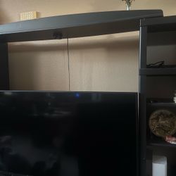 entertainment center with drawers