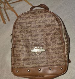 Juicy culture backpack , misc purses on very good condition make me offers