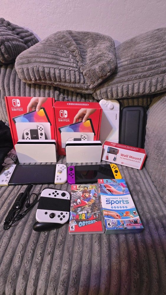 2 NINTENDO SWITCH OLED SYSTEMS $400 W/accessories