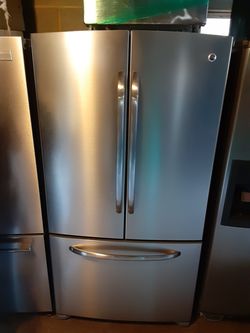 Ge stainless refrigerator/ three door