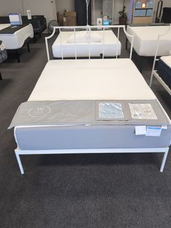 Mattress with frame full size floor model