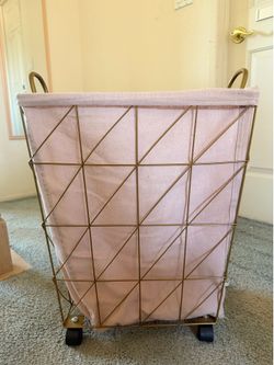 Hamper with pink washable liner and gold wire