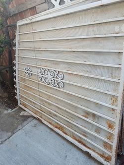 Large Metal Gate with Decorative Scrollwork