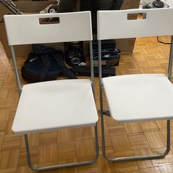 2 IKEA White Folding Chairs 