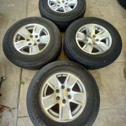 CHEVY SILVERADO OEM 17" RIMS AND TIRES 255/70/17 BRIDGESTONE DUELER WITH LIKE 99% LIFE LEFT ALMOST NEW