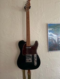Mint Fender telecaster custom black noiseless pickups with case.