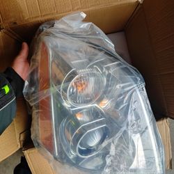 2006 Cadillac DTS headlights BRAND NEW!