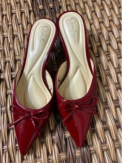 Red Jessica Simpson pointed toe heels