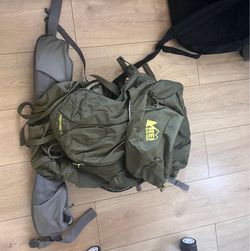 Dark green Kelty traverse backpack 70