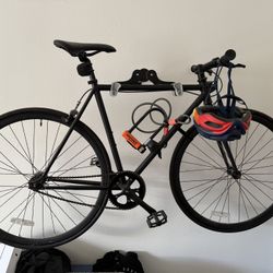 Fixed gear road bike, helmet, lock and wall mount
