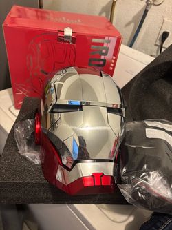 mechanical iron man helmet with voice commands and a wireless remote