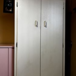 Free:  Ivory Storage Armoire