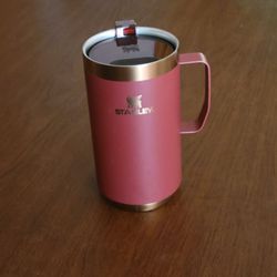 STANLEY The Stay Hot Camp Mug 24oz 709ML in Pomegranate Red color, 
Pre-owned, perfect shape, please see the photos.  It is 6 7/8" tall, 
weight 15oz 