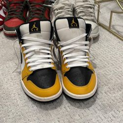 Yellow And Black Jordan 1's Mids