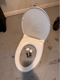 Toto elongated soft close toilet seat & lid
