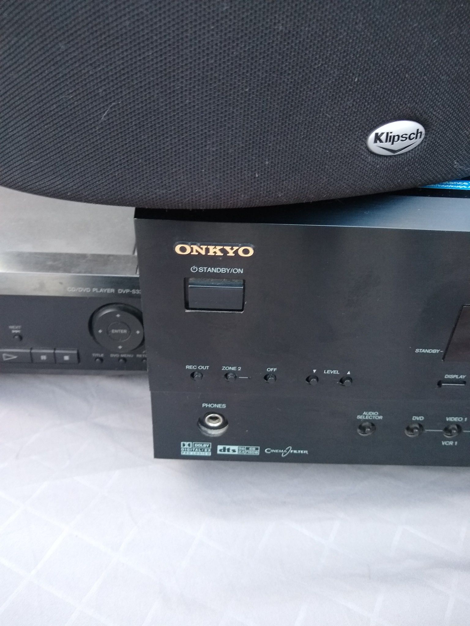 Onkyo dial zone receiver and Klipsch speakers.
