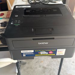 Two. Printers, a Brother, and a canon.