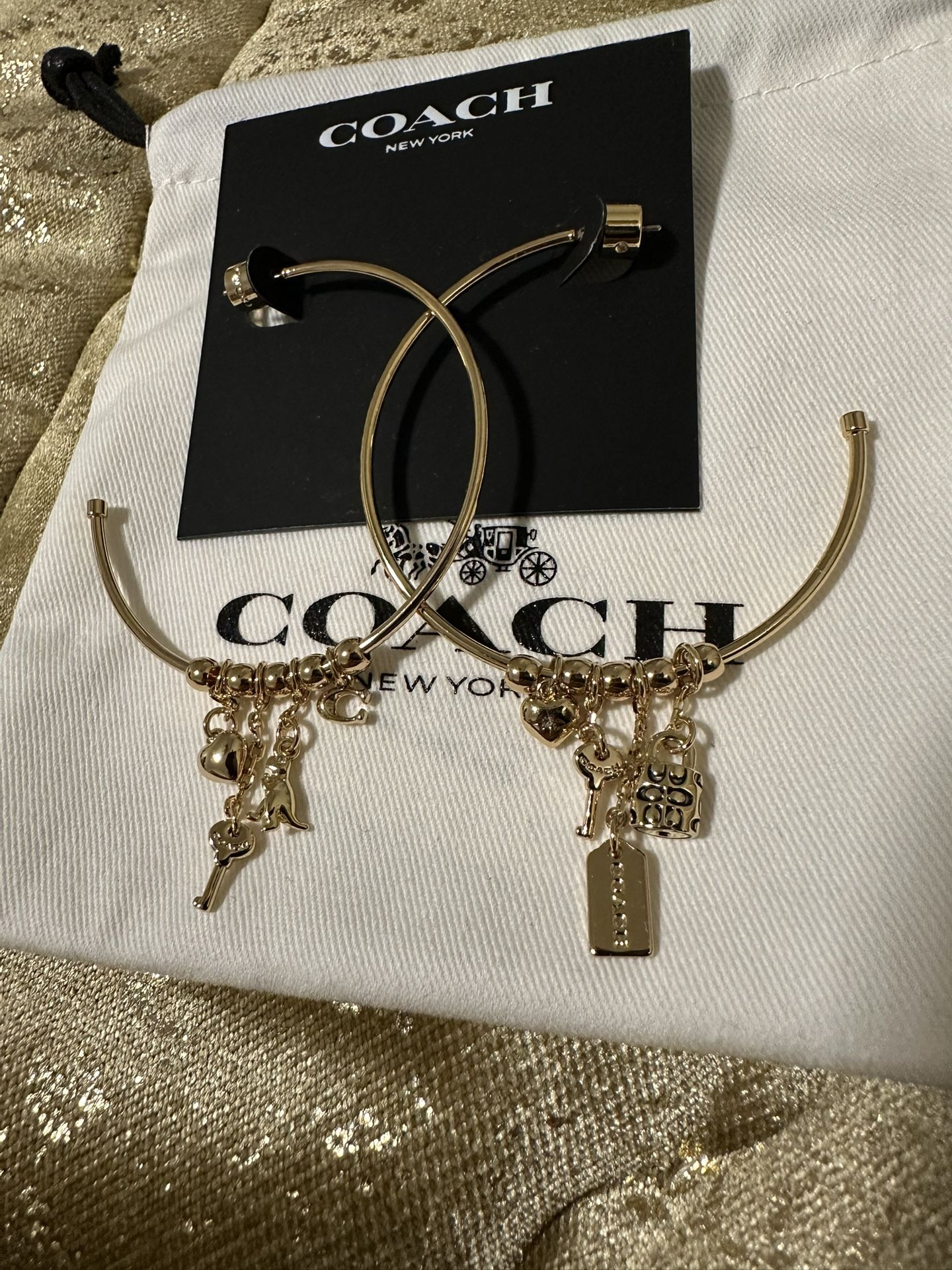 Coach gold charm hoop earrings 