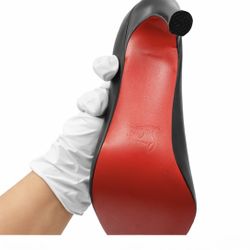 These are Christian Louboutin black leather pointed-toe pumps — commonly known as Louboutin “So Kate” / classic stiletto pumps.