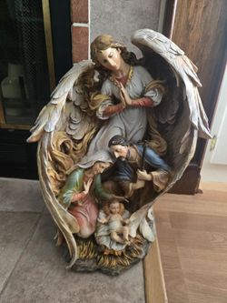 Guardian angel and the Holy Family figurine