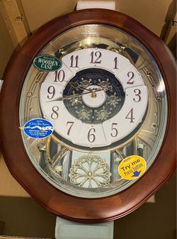 Rhythm Motion Wall Clock