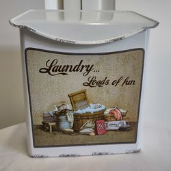 Laundry basket measures 8 inches tall and 6 1/2 inches wide.  New