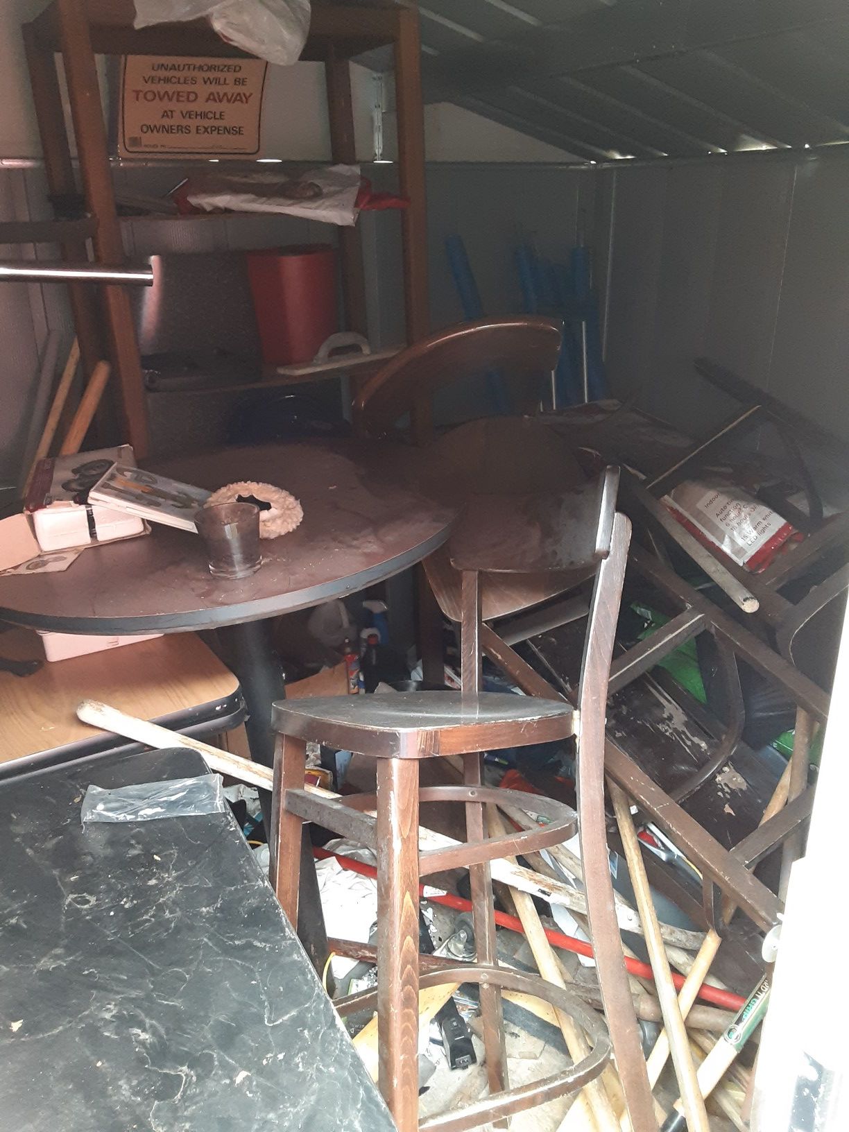 A group of bar tables and chairs for sale