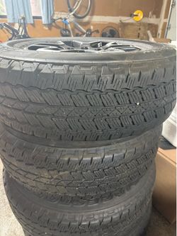 5 Bronco rims and Bridgestone duelers