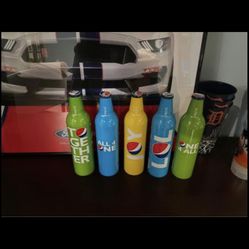 Pepsi and Mountain Dew Collectible Bottles.