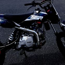 Automatic SSR dirt bike 125 , Polaris adult size helmet 