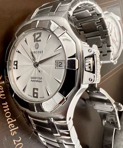 CONCORD SARATOGA. Authentic Concord Saratoga. Swiss Automatic Luxury Watch. A striking fusion of Swiss precision and timeless design. This Concord Sar