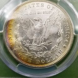 "TONED" 1886-P MORGAN SILVER DOLLAR (MS64)