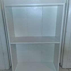 small 36"h 24 1/2"w 9 1/2"d white 2 shelf bookcase $15 FIRM