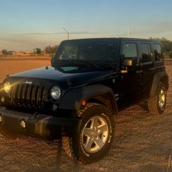 2016 Jeep Wrangler Unlimited Sport - $18,900