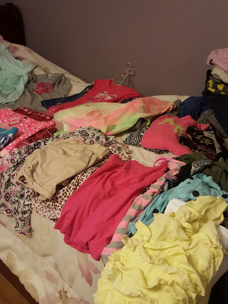 tons of clothes $2 each size 8 to 14 girls