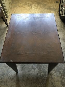 Two end tables and one coffee table