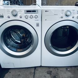 LG.  WASHER AND GAS DRYER 
