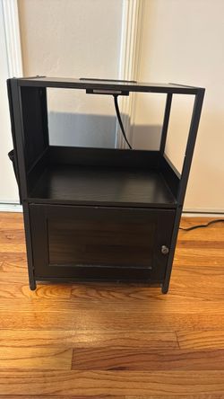 Nightstand with included outlets and USB ports