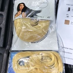 New Bellami hair extensions. Also comes with hanging carry bag. 220g 22" bleach blonde. Real. make. Offer