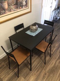 Black dining table set with 4 chairs