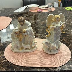 These Two Ceramic Figures Are Beautiful. The Angel Is A Music Box.