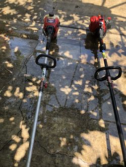 Two gas powered weedeaters