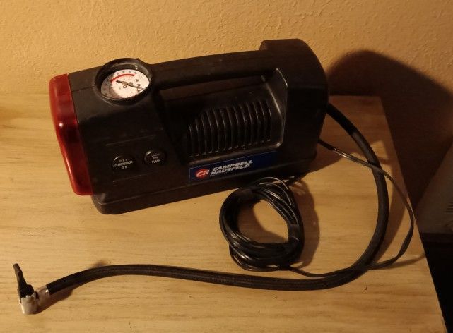A Campbell Hausfeld 12 Volt Inflater 300 Psi