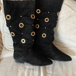  Black Suede Leather Boots With Gold Grommet Style Designs On Both Sides And The Front Of The Boots  Size 10 medium