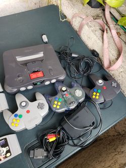 11 N64 Games With Nintendo N 64 Console With memory cards & expansion packed. 3 controls & all for $400! Or Trade are welcome