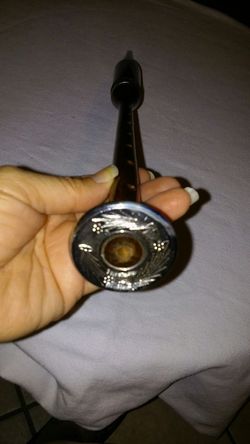 An instrument from India with flute or a trumpeti